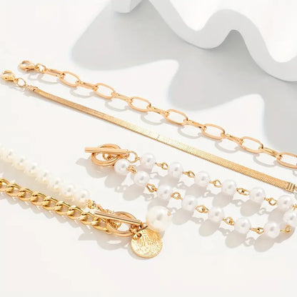 Chic 4-Piece Gold Bracelet Set – Snake Chain, Pearls & Links